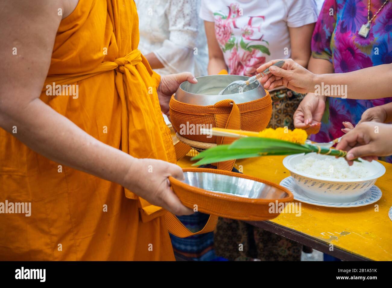 Buddhist monk alms round hi-res stock photography and images - Alamy