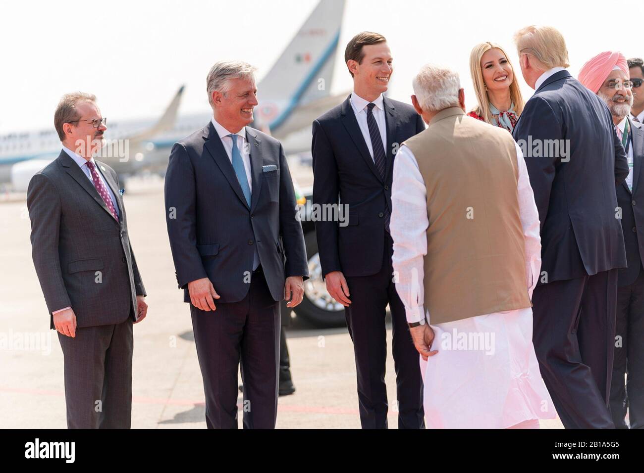 Ahmedabad, India. 24th Feb, 2020. U.S. President Donald Trump introduces Indian Prime Minister Narendra Modi, to members of his delegation on arrival at Sardar Vallabhbhai Patel International Airport February 24, 2020 in Ahmedabad, Gujarat, India. Standing from left to right are: National Security Advisor Robert O'Brien, son-in-law Jared Kushner and first daughter Ivanka Trump. Credit: Shealah Craighead/White House Photo/Alamy Live News Stock Photo
