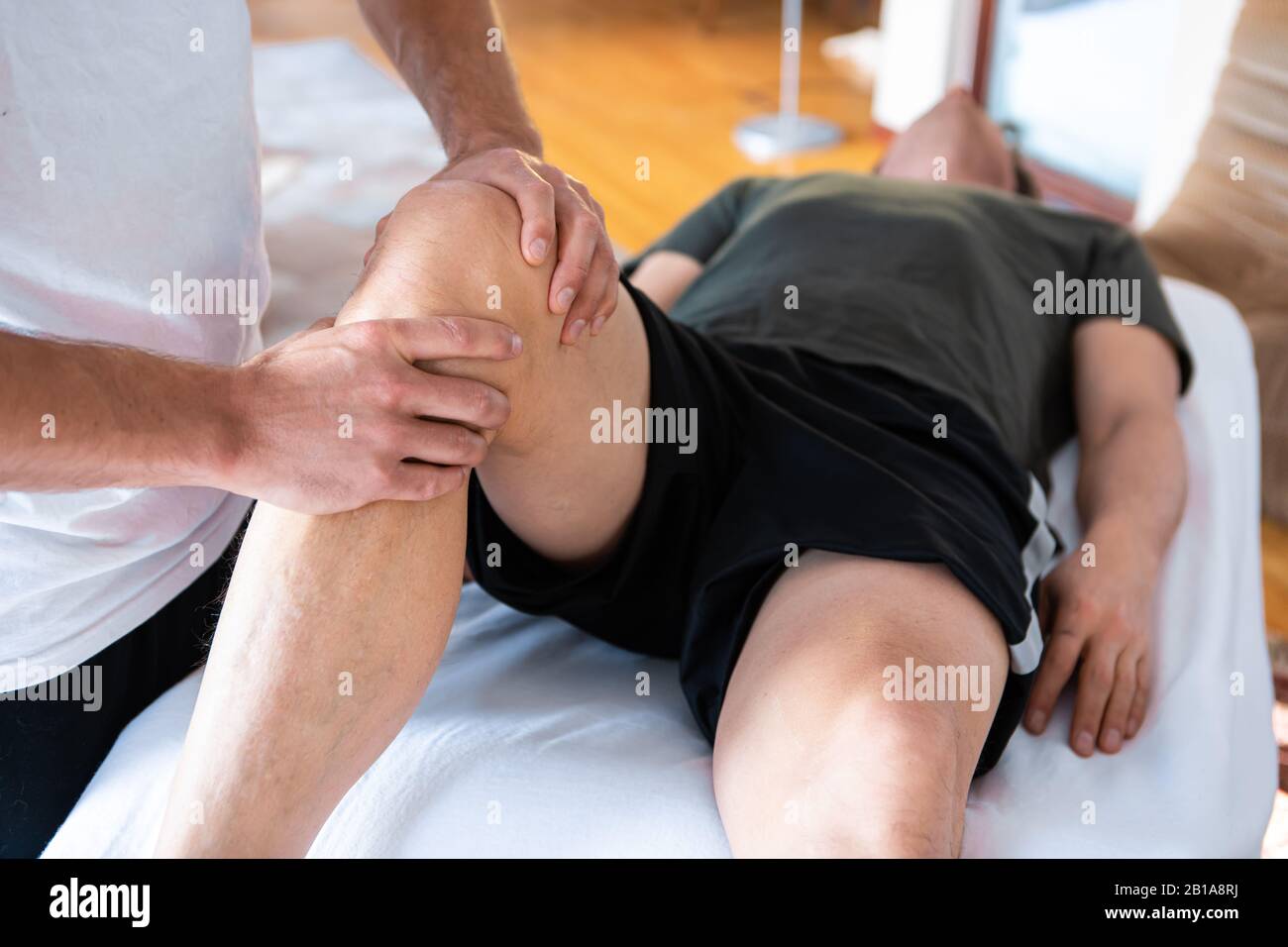 Professional massage therapist massaging hires stock photography and — free download