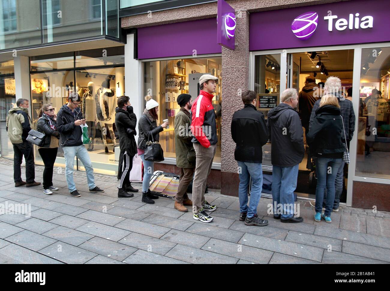 People who queued up to buy new iPhone 4 in a Telia store. Telia Company AB  is a Swedish-Finnish multinational telephone company and mobile network  operator present in Sweden, Finland, Norway, Denmark,