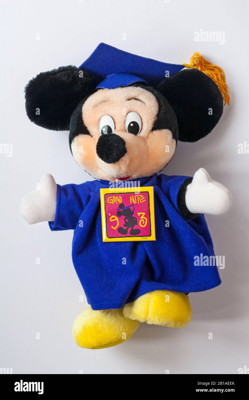 Grad Nite soft plush toy Walt Disney World - Mickey Mouse graduation toy isolated on white background Stock Photo