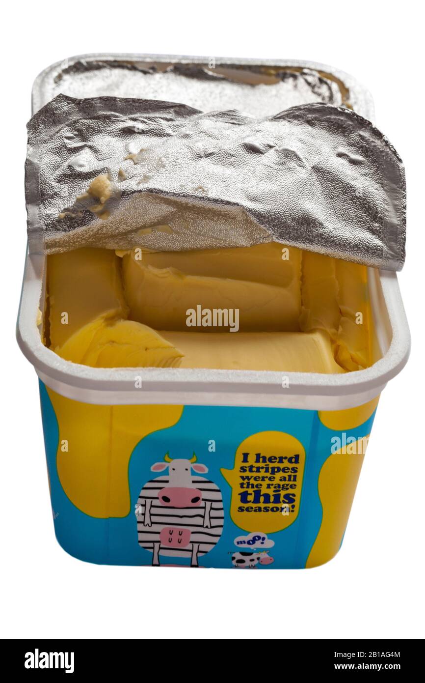 tub of I can't believe it's not butter Light, I herd stripes were all the rage this season - foil peeled back to show spread set on white background Stock Photo