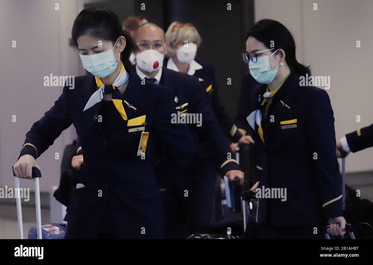 Hong Kong, China. 24th Feb 2020. Lufthansa Asian cabin crew wearing