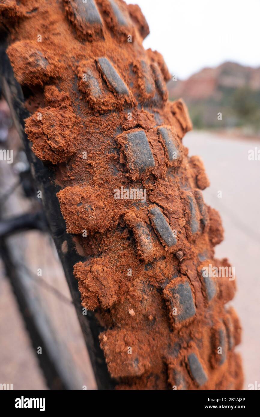Muddy mountain bike tire Stock Photo Alamy