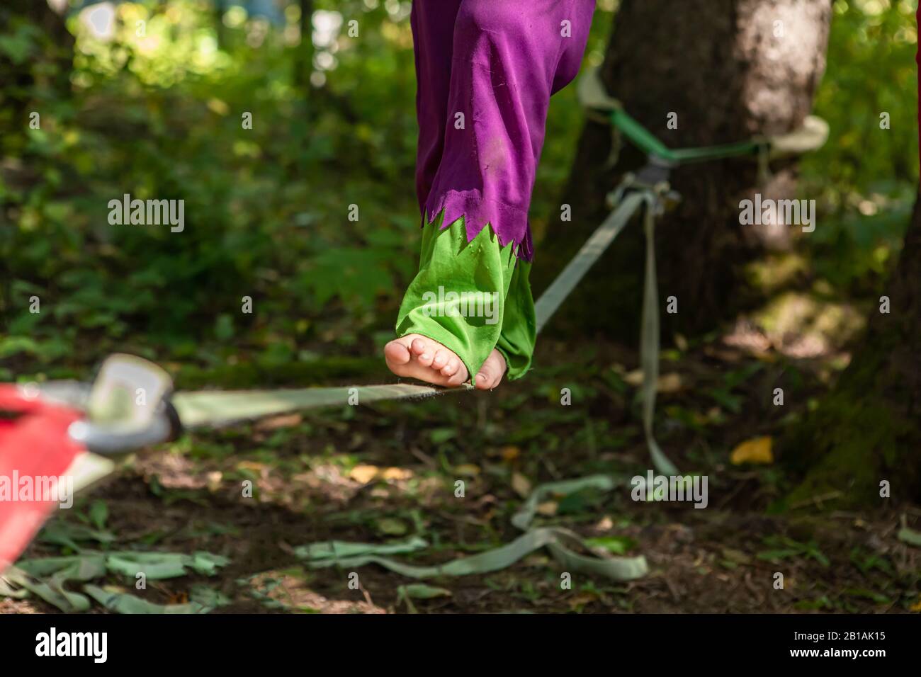 A creative cropped view with selective focus as a youngster walks ...