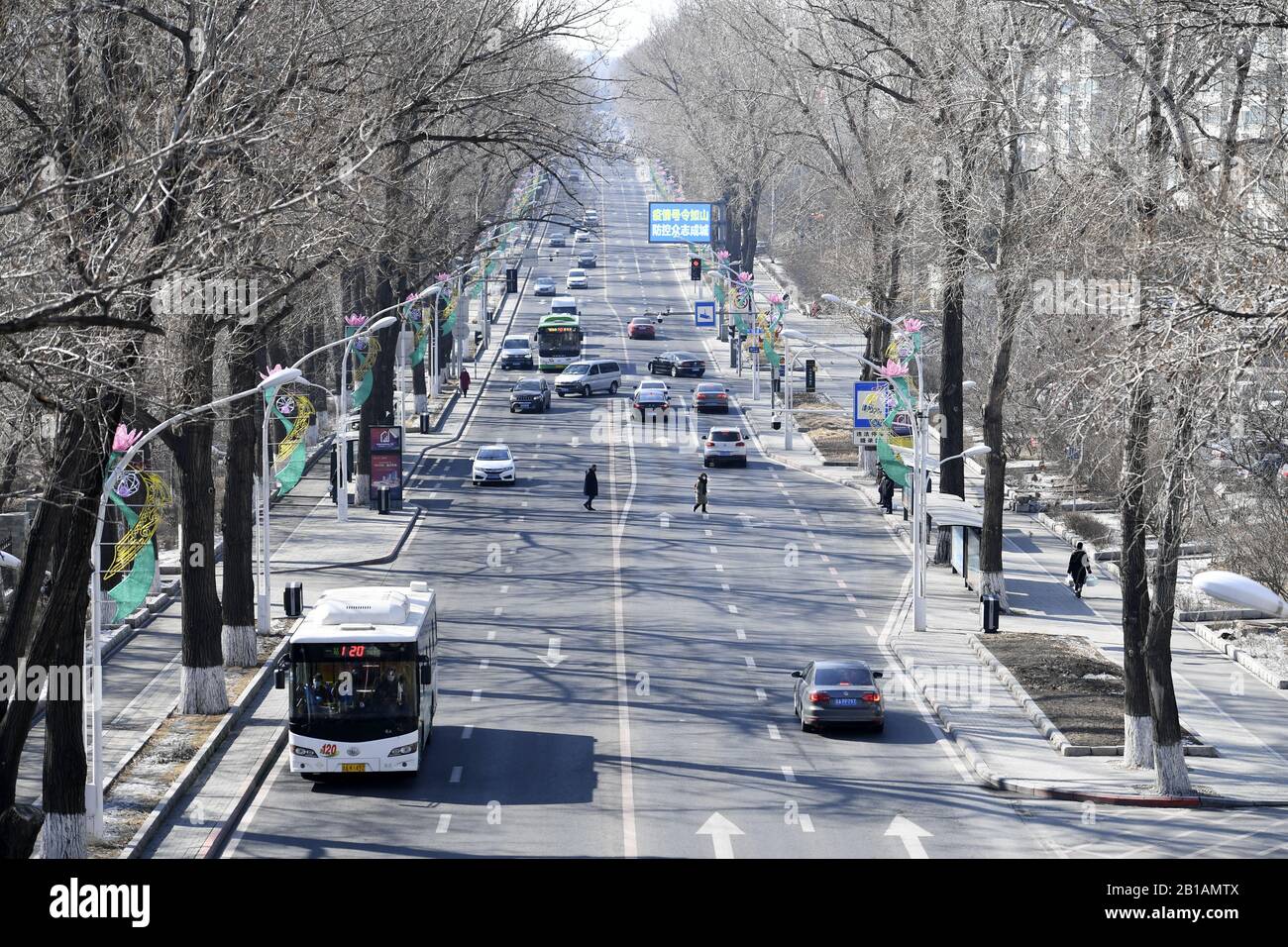 Jilin，CHINA-On February 20, 2020, Changchun, Jilin province, under the premise of doing a good job in epidemic prevention and control, some enterprises in Changchun began to resume production.Subway and bus services were restored, and parks were reopened.But some shops on the streets remain closed.(EDITORIAL USE ONLY. CHINA OUT) (Photo by /Sipa USA) Stock Photo