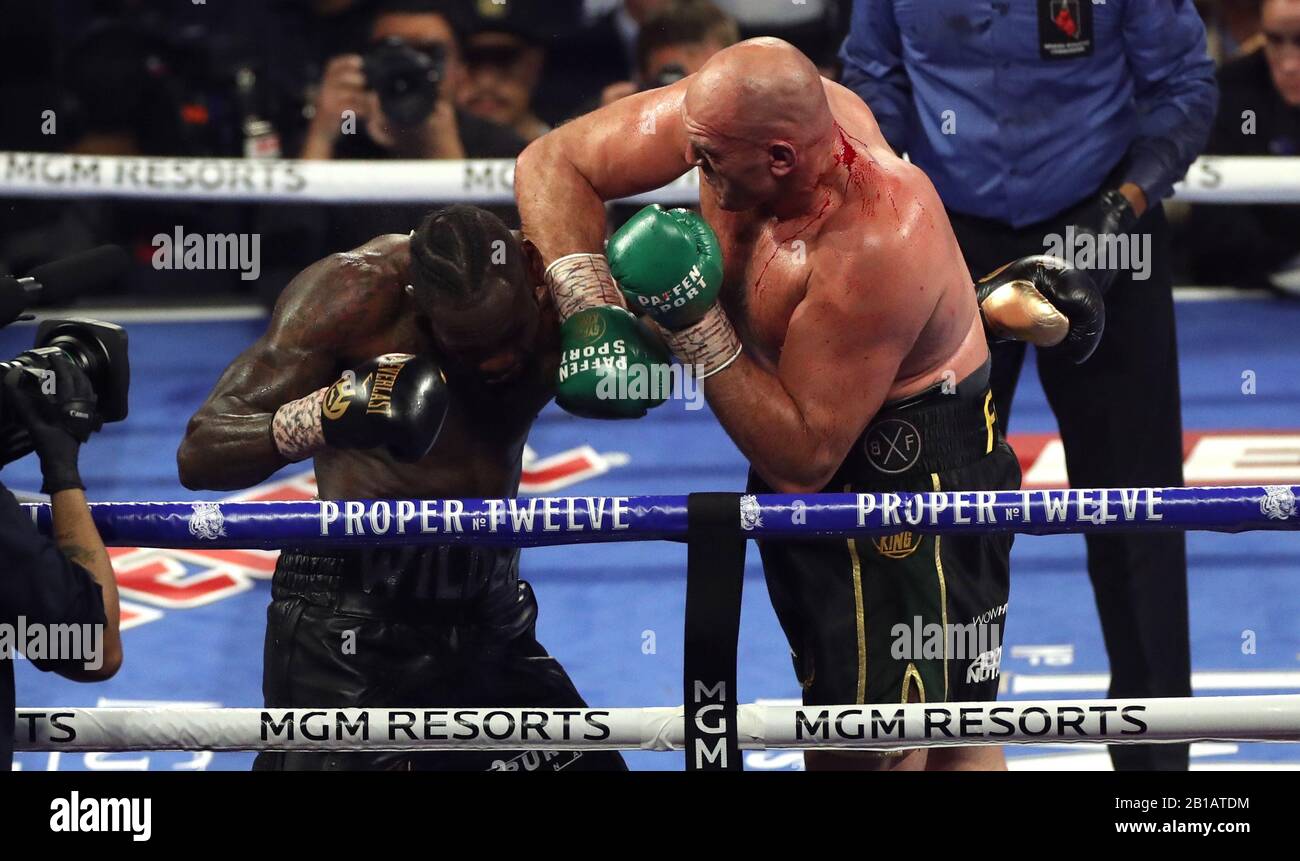 Tyson Fury (right) and Deontay Wilder during the World Boxing Council World Heavy Title bout at the MGM Grand, Las Vegas Stock Photo