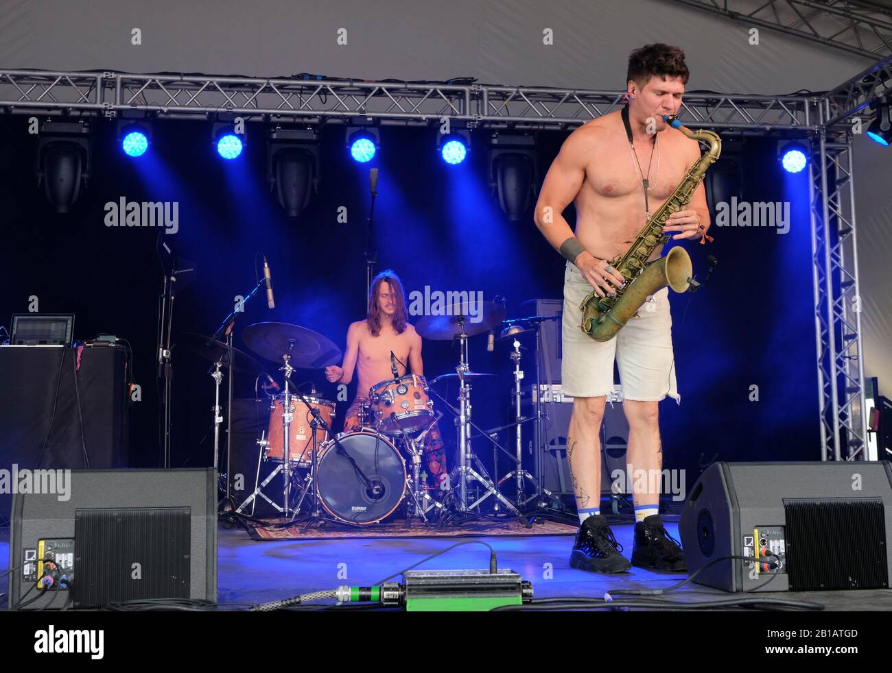 Saxophonist, Mike Wilbur and drummer, EThan Snyder of Moon Hooch performing on the Charlie Gillett stage at WOMAD, Charlton Park, Malmesbury, UK. July Stock Photo