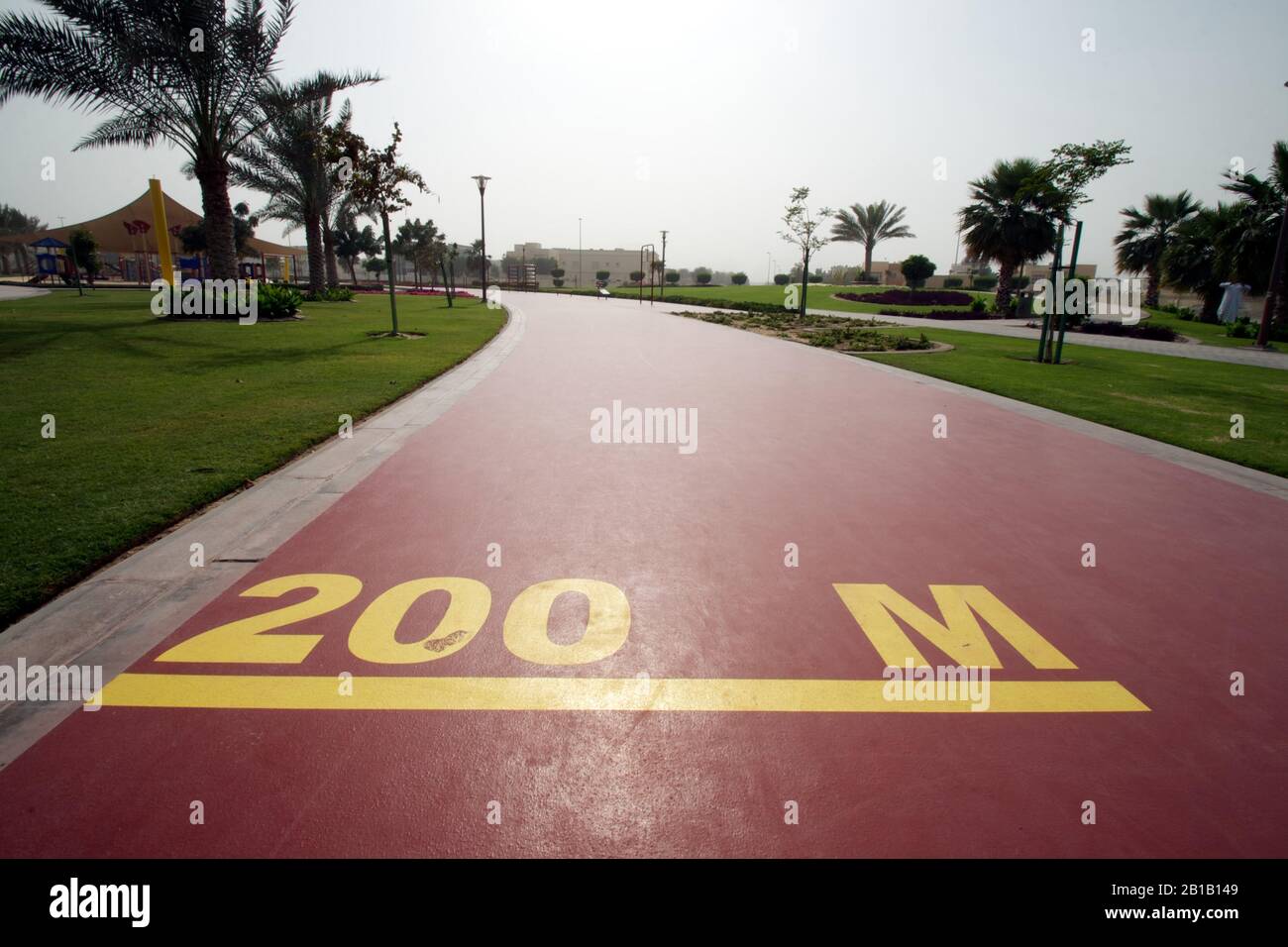 Dubai-Al Barsha Pond Park running track mark 200 M wide Stock Photo