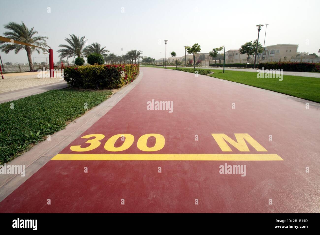 Dubai-Al Barsha Pond Park running track mark 300 M wide Stock Photo