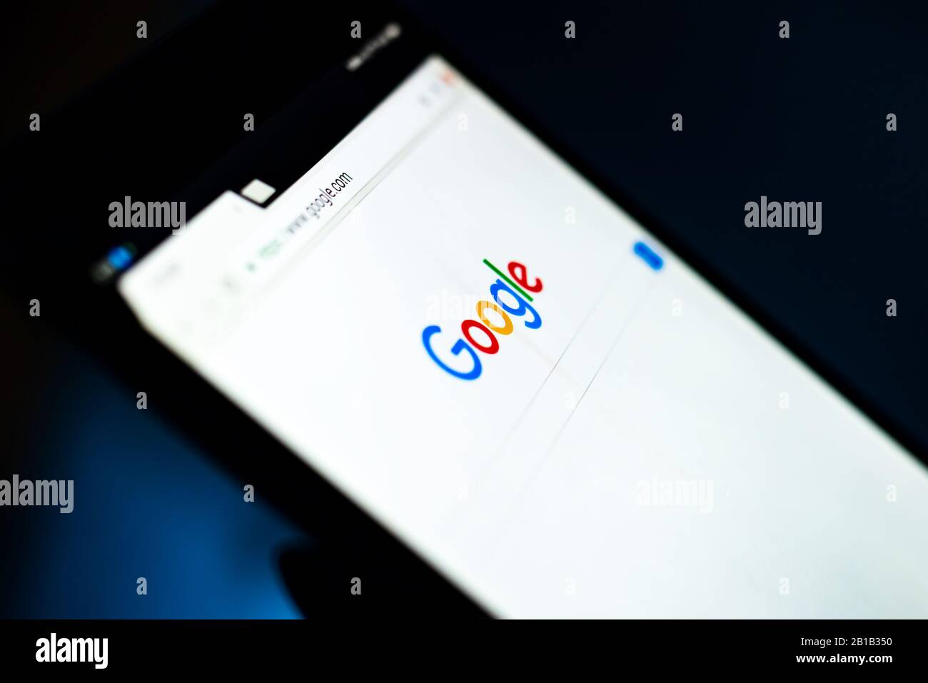 close up tablet with Google Stock Photo
