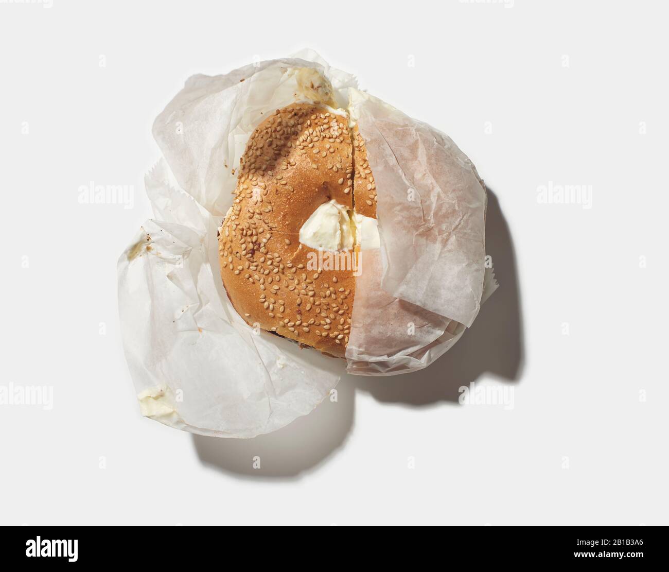 Toasted Sesame Bagel with cream cheese Stock Photo