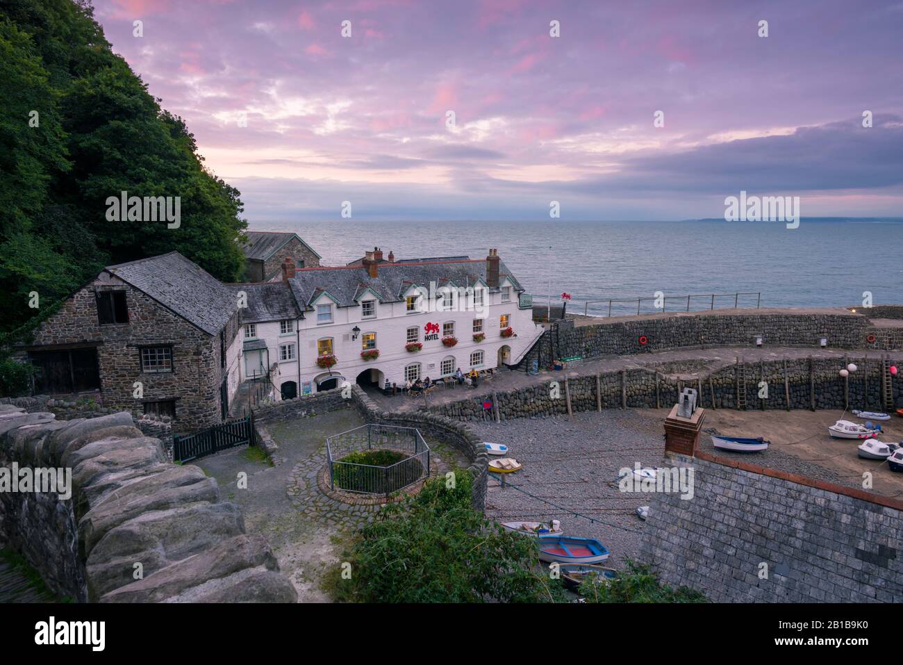 The harbour village of Clovelly on the North Devon coast and Bideford Bay beyond, England. Stock Photo