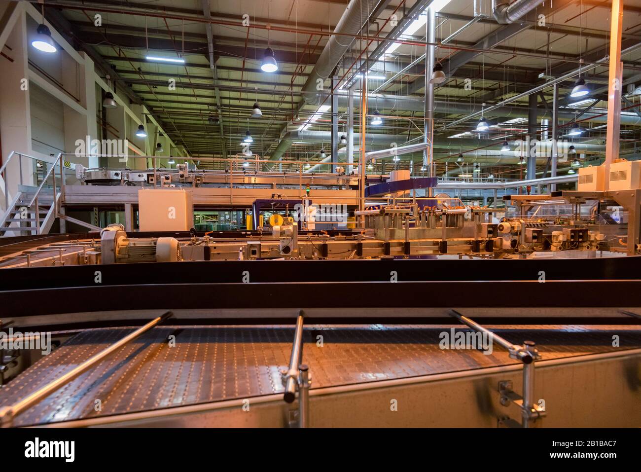 View of tubes and appliances at soft drinks factory Stock Photo Alamy
