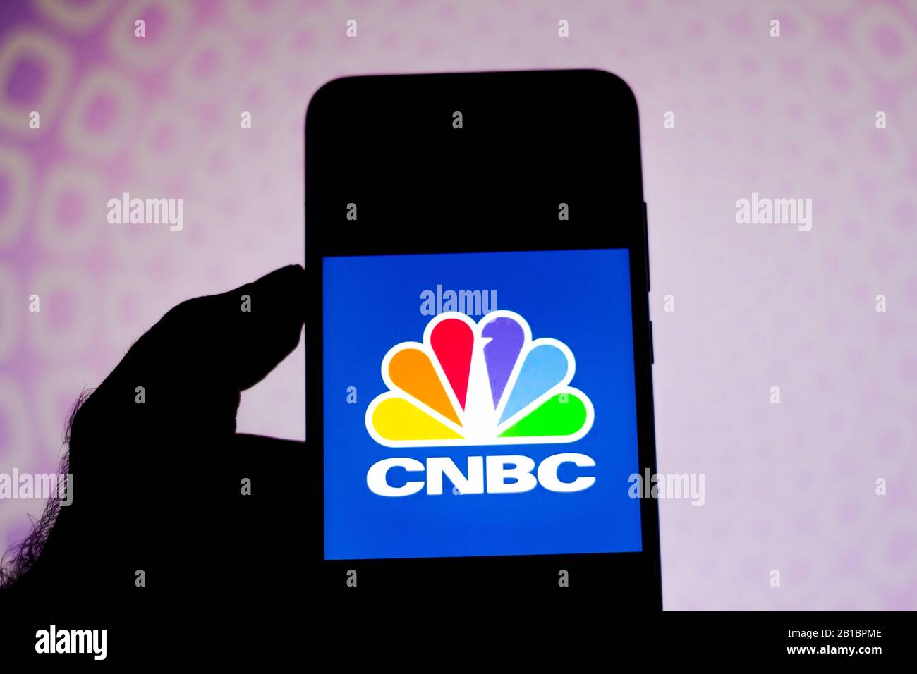 In this photo illustration a CNBC (Consumer News and Business Channel) logo seen displayed on a smartphone. Stock Photo