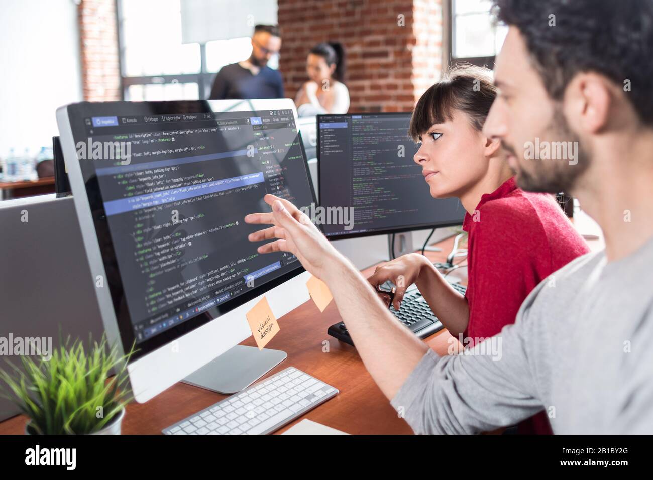 Developing programming and coding technologies. Website design. Programmer working in a software develop company office. Stock Photo