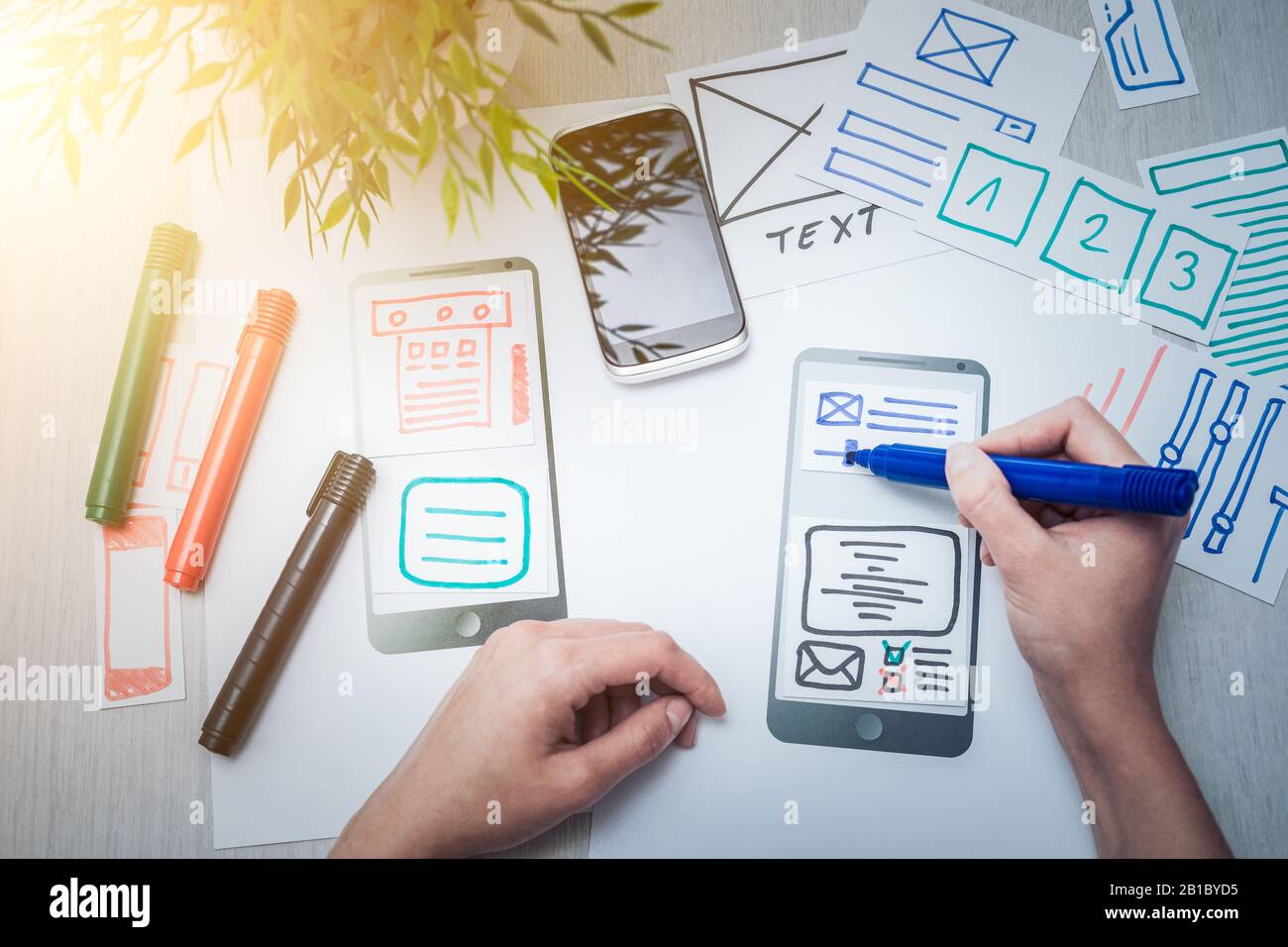 Designer woman drawing website ux app development. User experience concept. Stock Photo