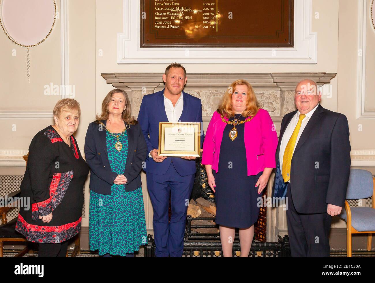 Warrington, UK. 24th Feb 2020. Ben Westwood recieves his certificate as Honorary Citizen of Warrington Town from Mayor Wendy Johnson, with Consort Beverley Hallam, nominator Councillor Mike Hannon and sconder Cllr Pauline Nelson Credit: John Hopkins/Alamy Live News Stock Photo