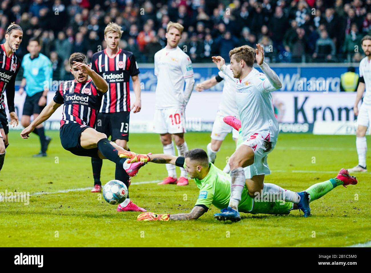 24 February 2020, Hessen, Frankfurt/Main: Football: Bundesliga, 23rd matchday, Eintracht Frankfurt - 1 FC Union Berlin, in the Commerzbank Arena. Frankfurt's Andre Silva (l) fails against Berlin goalkeeper Rafal Gikiewicz. Photo: Uwe Anspach/dpa - IMPORTANT NOTE: In accordance with the regulations of the DFL Deutsche Fußball Liga and the DFB Deutscher Fußball-Bund, it is prohibited to exploit or have exploited in the stadium and/or from the game taken photographs in the form of sequence images and/or video-like photo series. Stock Photo