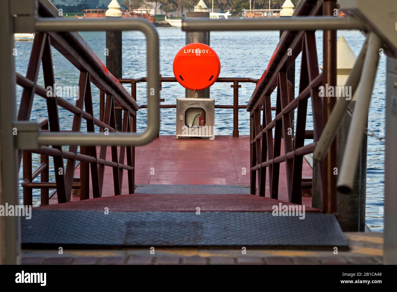 Dubai-Gate access at the Al Seef Marine Transport Station 1 with Lifebuoy in focus Stock Photo