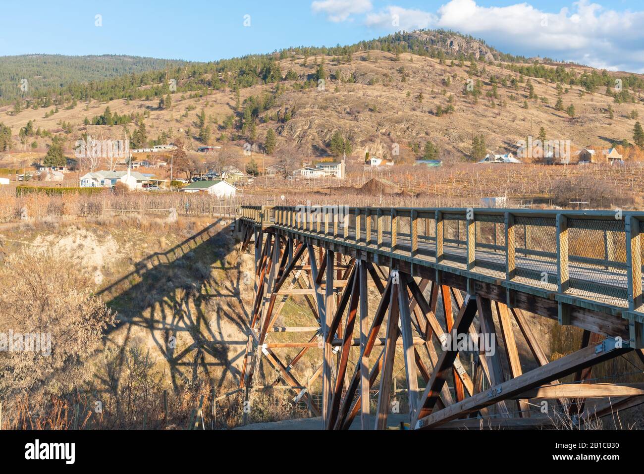 Wooden trestle bridge across a ravine on the Kettle Valley Rail Trail in the Okanagan Valley