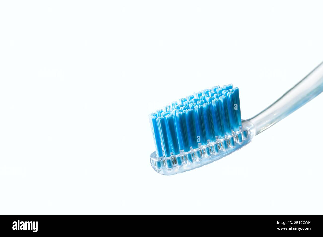 Toothbrush and toothpaste on blurred background. care for the oral