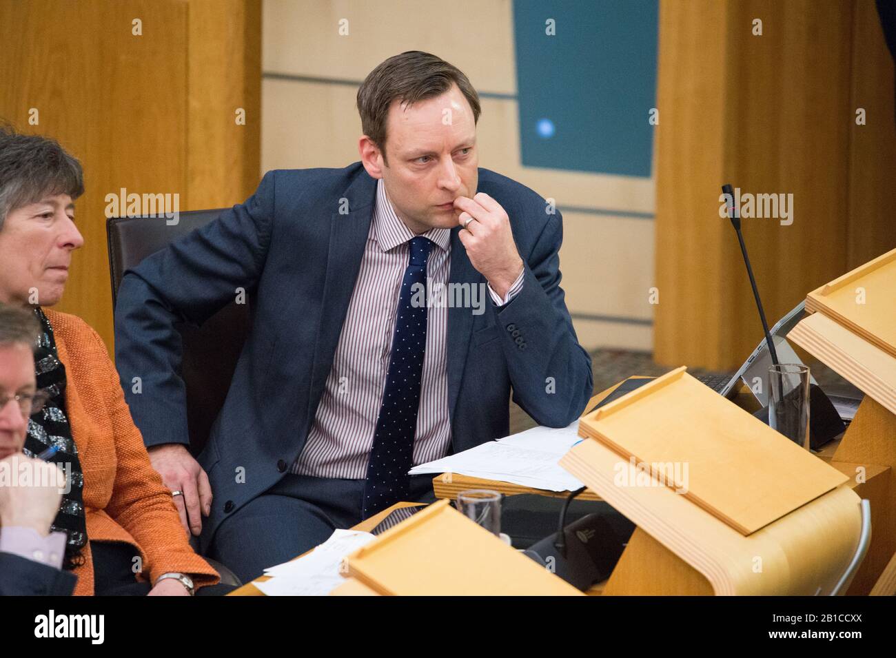 Edinburgh, UK. 20 February 2020.   Pictured: Liam Kerr MSP - Deputy Leader of, the Scottish Conservative and Unionist Party and Shadow Cabinet Secretary for Justice.  Scenes from inside the debating chamber of the Scottish Parliament in Holyrood, Edinburgh. Stock Photo