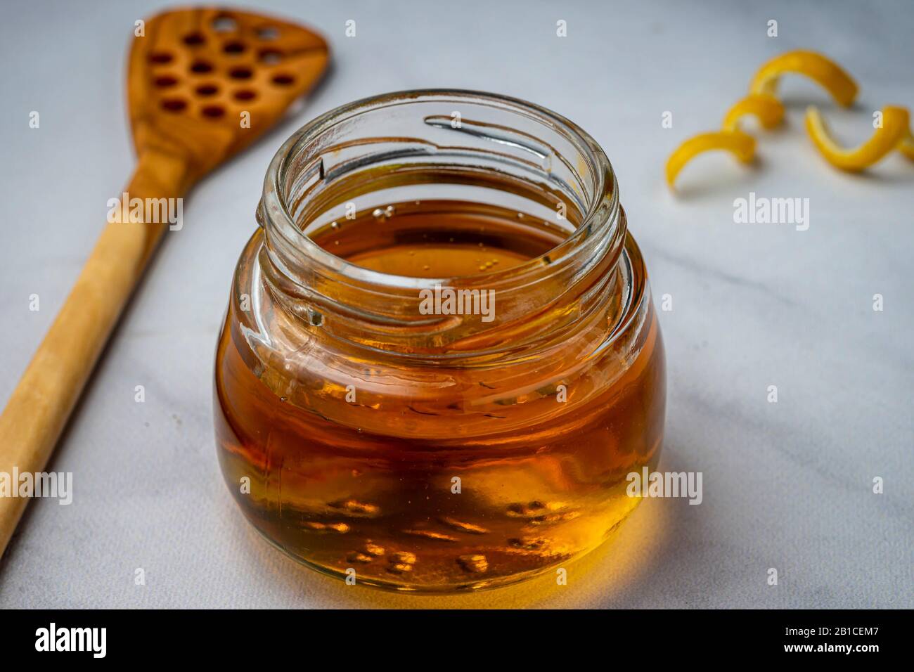 Organic honey in a small jar Stock Photo Alamy
