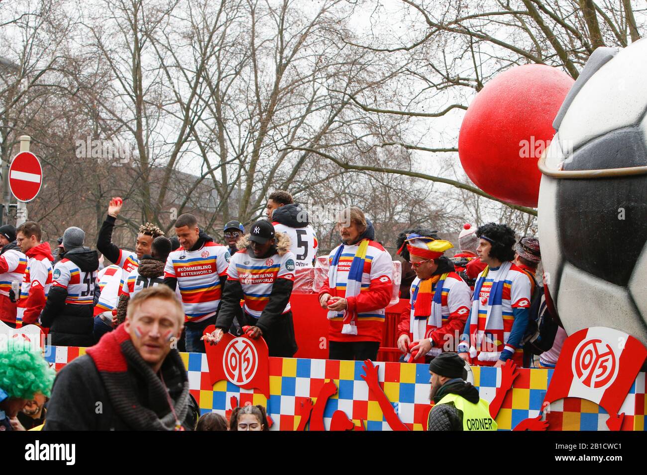 Mainz, Germany. 24th February 2020. Members of the first team of the local Bundesliga football club 1. FSV Mainz 05 ride on a float in the parade. Around half a million people lined the streets of Mainz for the traditional Rose Monday Carnival Parade. The 9 km long parade with over 9,000 participants is one of the three large Rose Monday Parades in Germany. Stock Photo