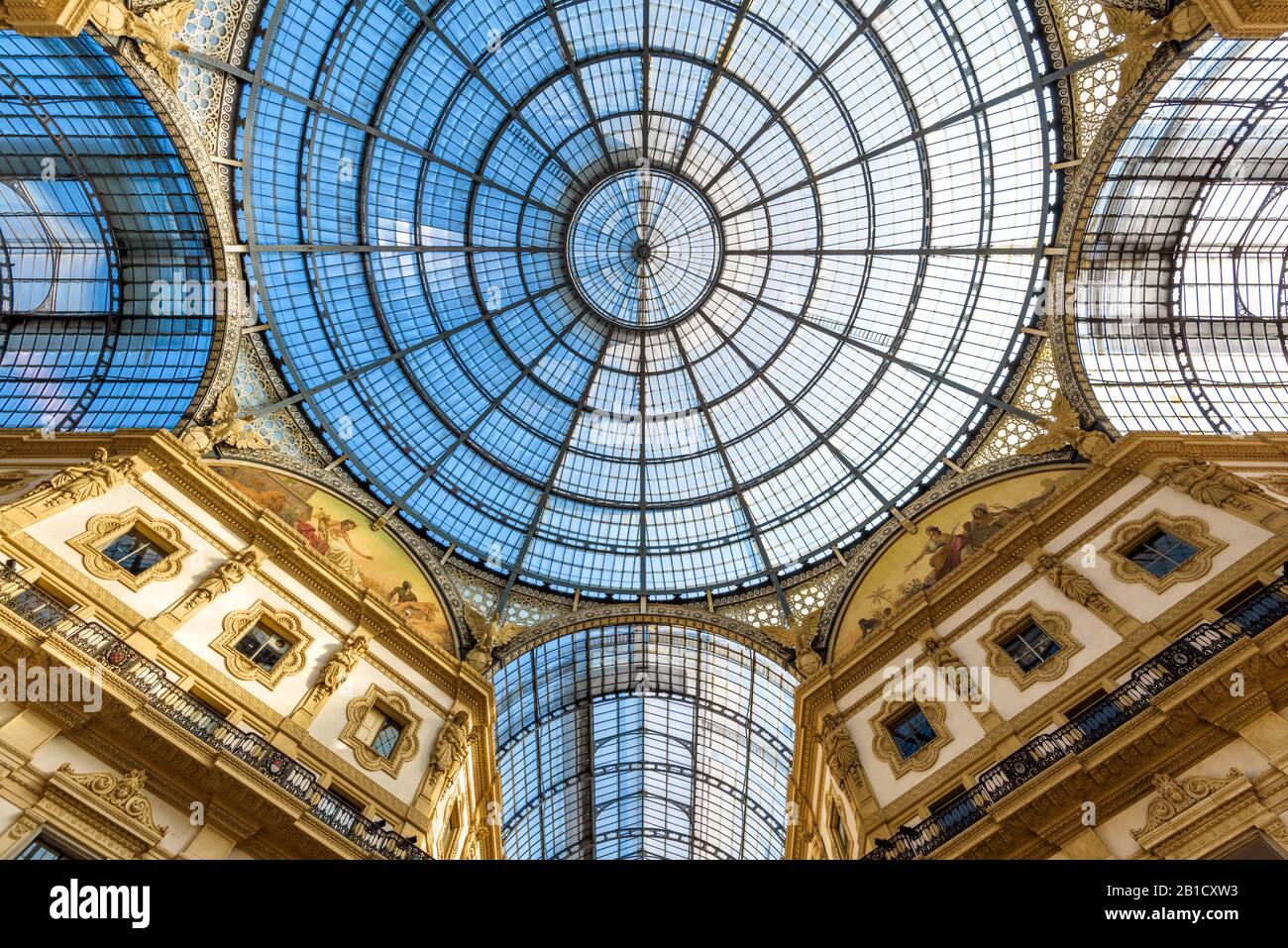 Glass dome of Galleria Vittorio Emanuele II in central Milan, Italy. This gallery is one of the world's oldest shopping malls and tourist attraction o Stock Photo