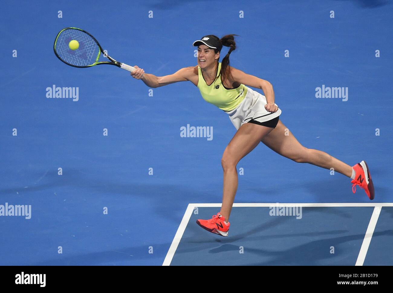 Doha, Qatar. 24th Feb, 2020. Sorana Cirstea of Romania hits a return during  the women's singles first round match against Elena Rybakina of Kazakhstan  at the 2020 WTA Qatar Open tennis tournament