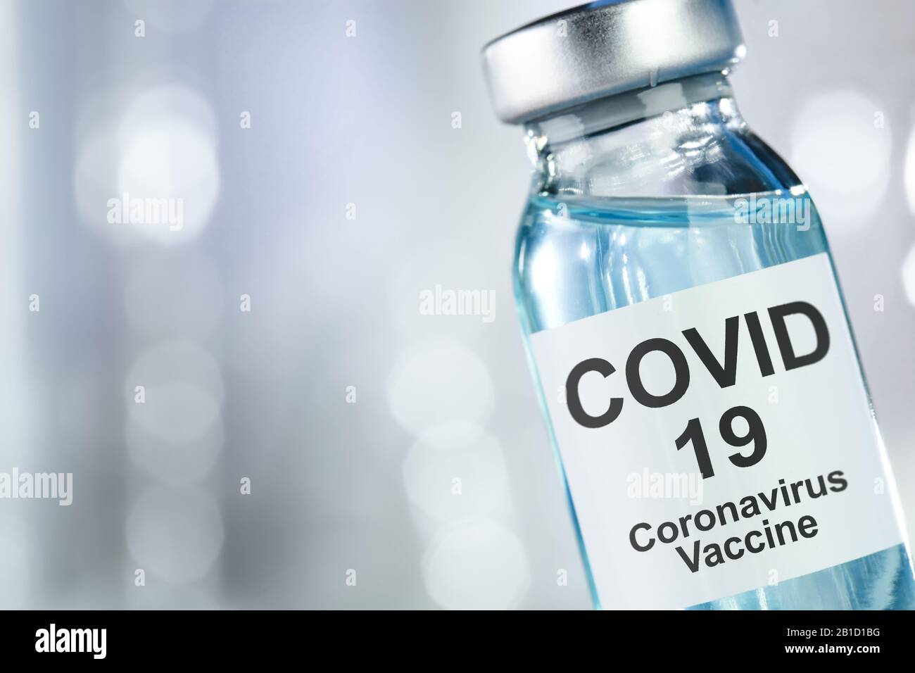 Healthcare cure concept with vaccine vial for Coronavirus, Covid 19 virus Stock Photo