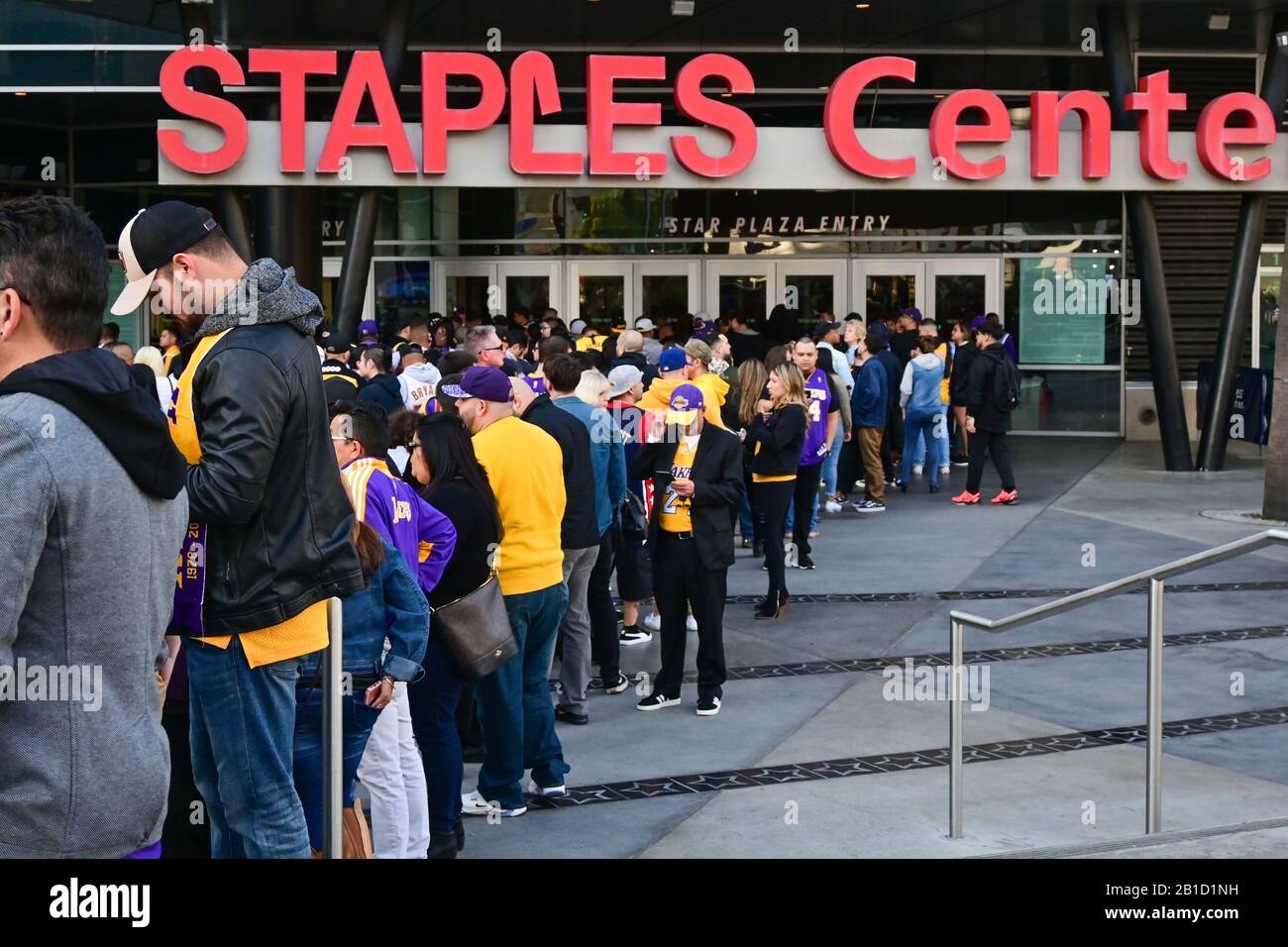 Los Angeles, California, USA. 24th Feb, 2020. Fans line up to enter the Staples Center before a