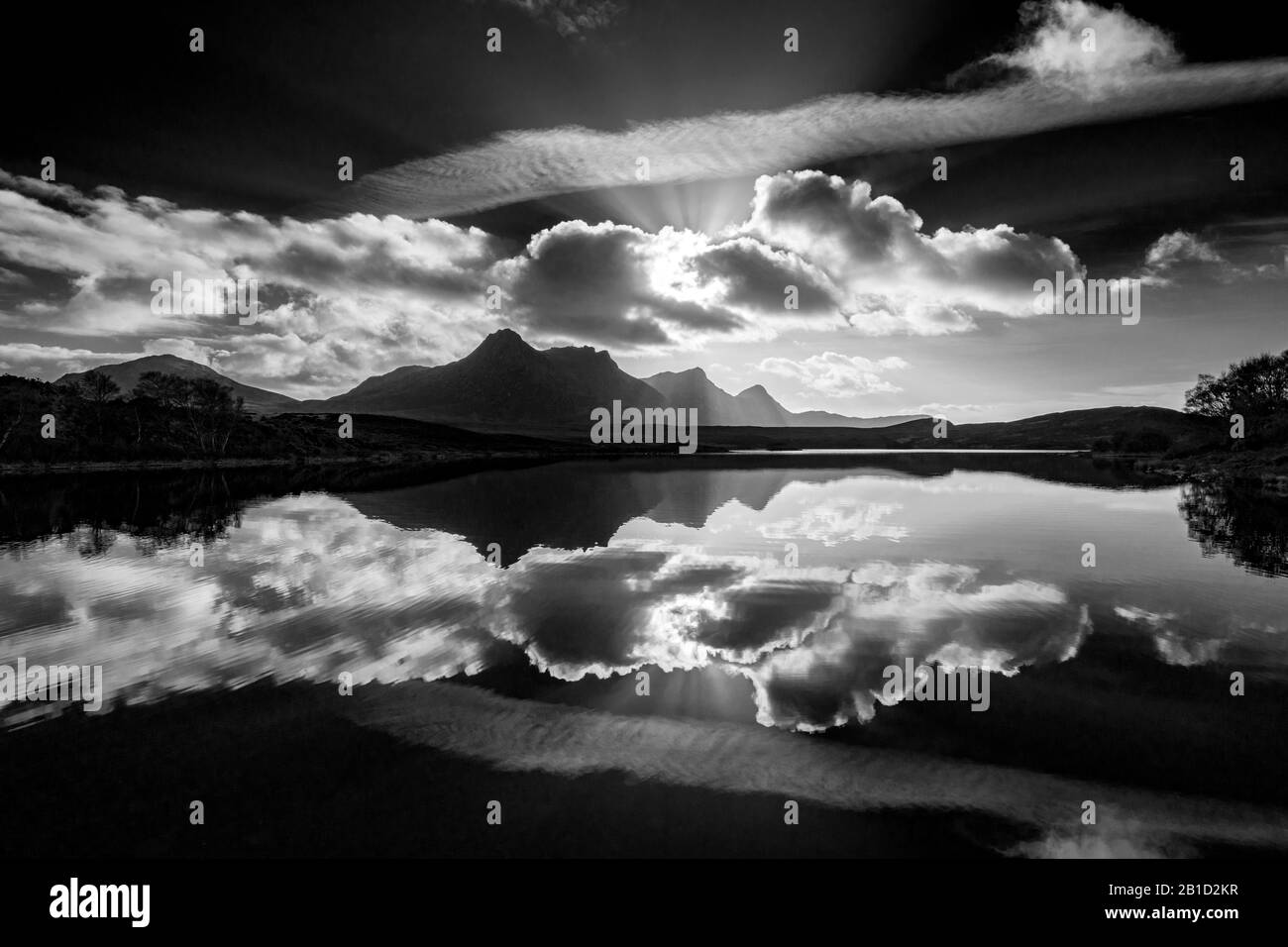 Ben Loyal reflected in Lochan Hakel.  Near Tongue, Sutherland, Scotland, UK Stock Photo