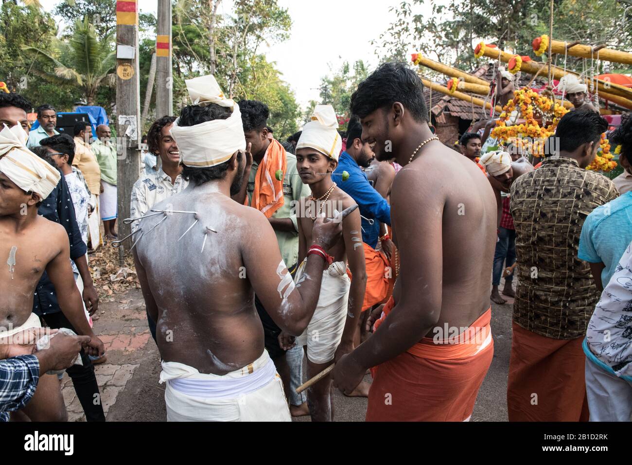 Devotee with spear-pierced mouths (Kavadi Aattam) as an act of devotion during Thaipooyam, or Thaipoosam, Festival in Kedakulam, Kerala. Stock Photo