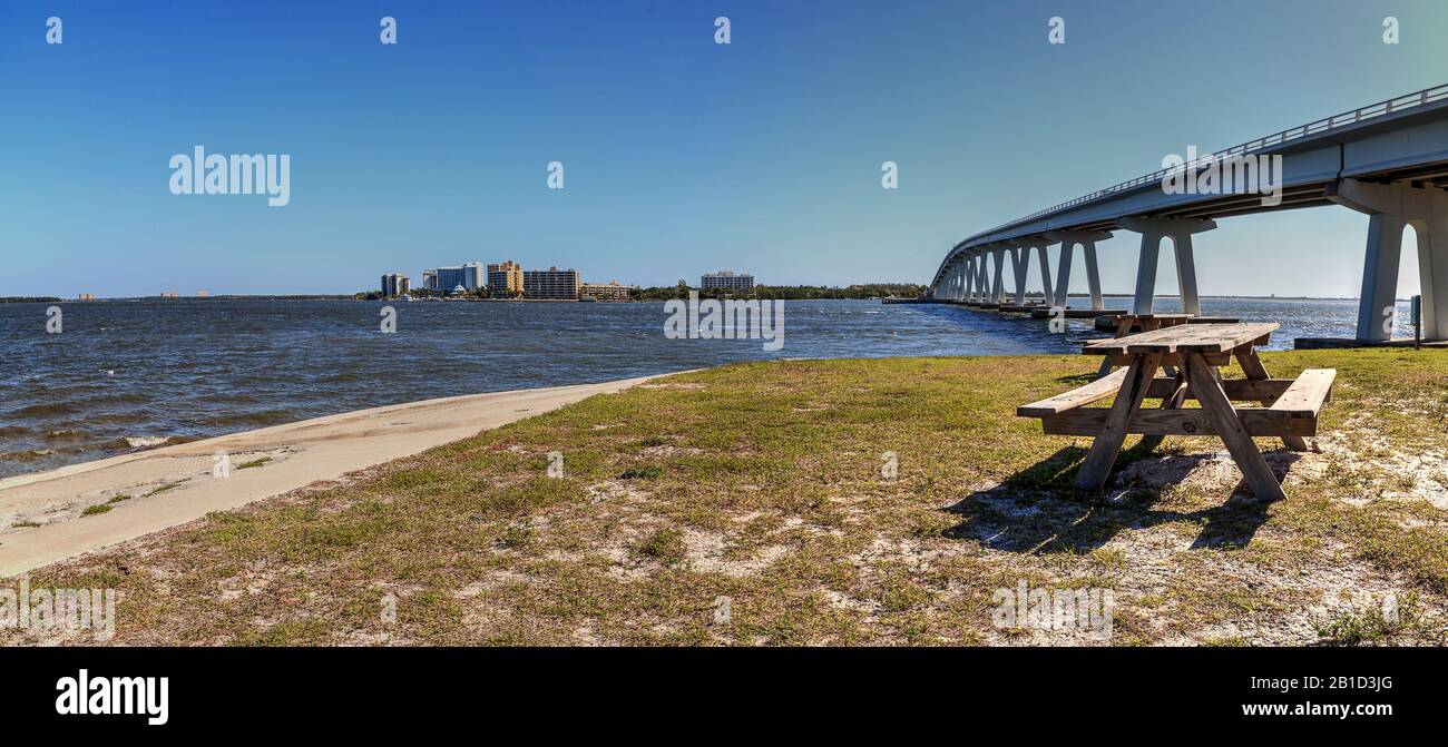 Sanibel Causeway bridge in the background of Causeway Islands Park on Sanibel in Florida. Stock Photo