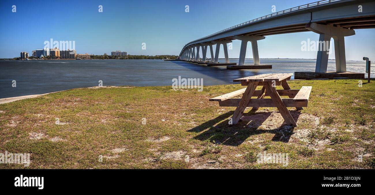Sanibel Causeway bridge in the background of Causeway Islands Park on Sanibel in Florida. Stock Photo