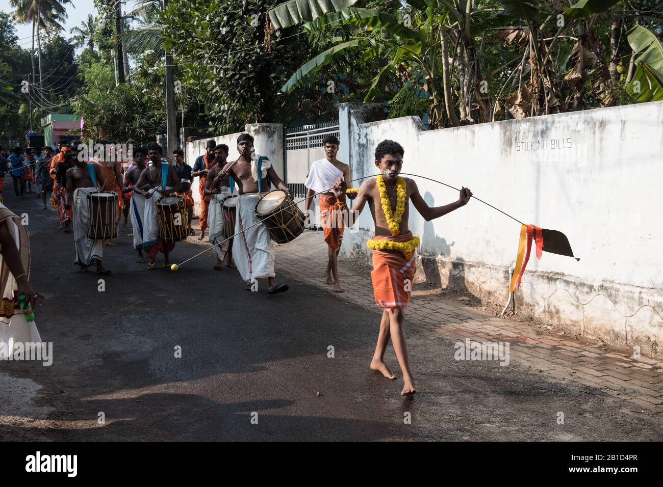 Devotees holding spears in their pierced mouths (Kavadi Aattam) as an act of devotion during Thaipooyam, or Thaipoosam, Festival in Kedakulam, Kerala. Stock Photo