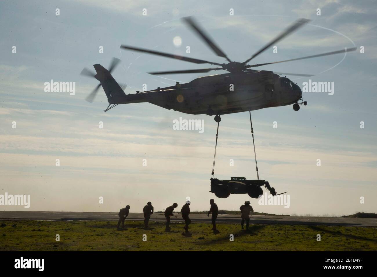 U.S. Marines with 1st Marine Logistics Group, 1st Transportation Support Battalion, Landing Support Company conduct an external lift testing the limits of the CH-53E Super Stallion, on Camp Pendleton, CA, January 15, 2019. Tipping the scales at around 28,000 lbs the Extended Boom Forklift provides Landing Support Company with a load that pushes the CH-53E near it’s external lift limits. (U.S. Marine Corps Photo by Sgt. Maximiliano Rosas) Stock Photo
