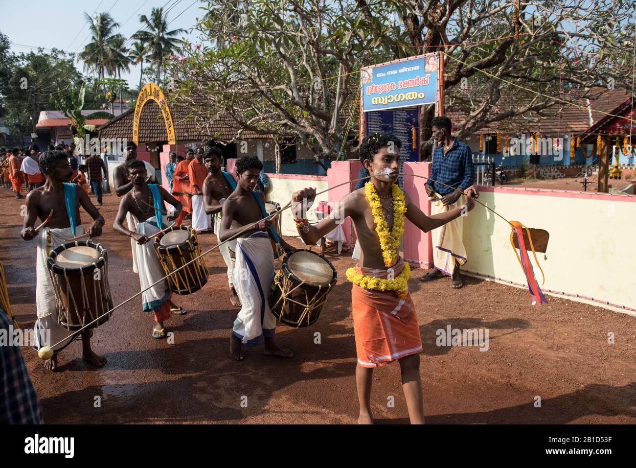 Devotees holding spears in their pierced mouths (Kavadi Aattam) as an act of devotion during Thaipooyam, or Thaipoosam, Festival in Kedakulam, Kerala. Stock Photo