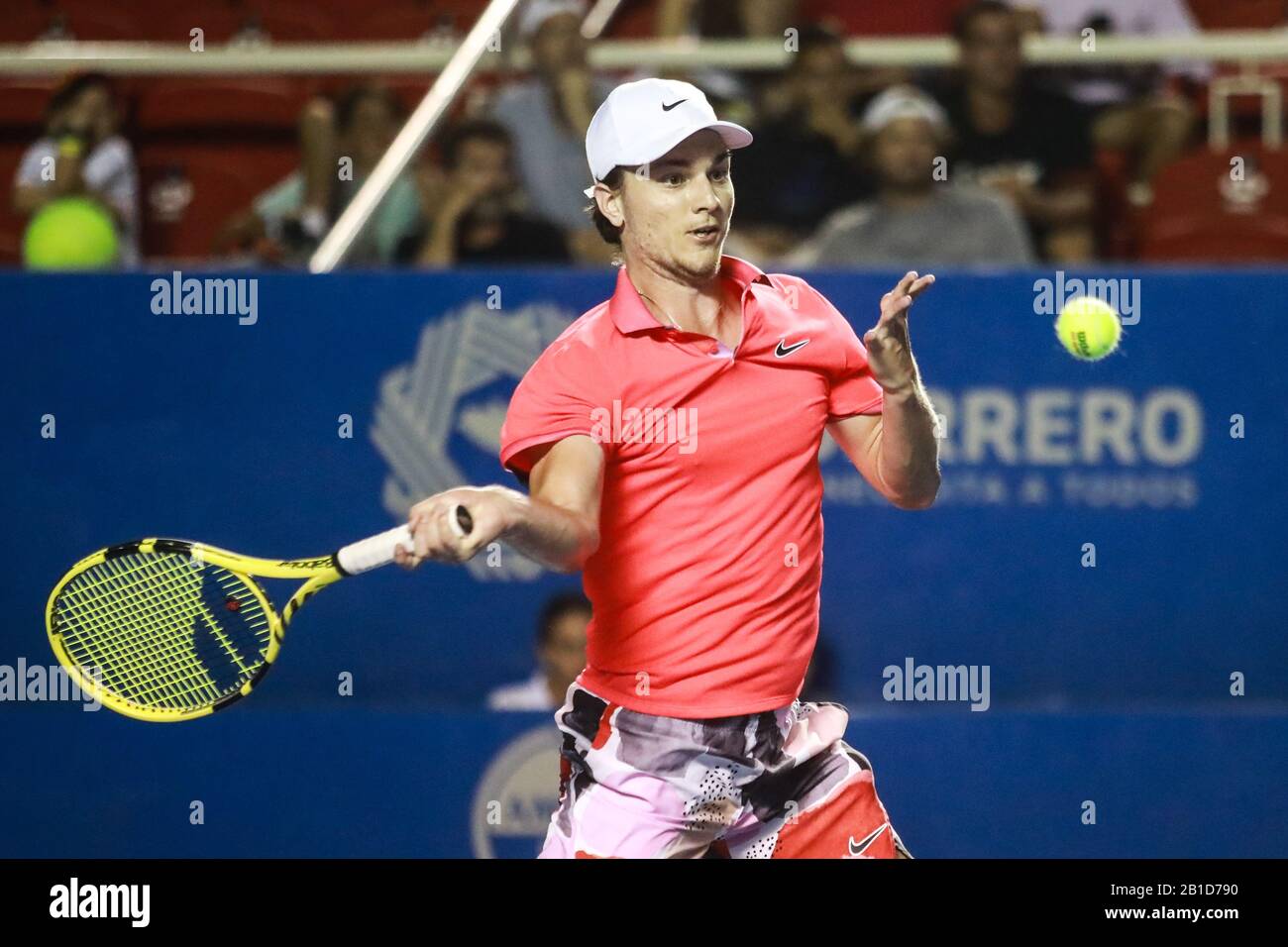 Acapulco, Mexico. 25th Feb, 2020. The Serbian Miomir Kecmanovic returns a  ball to Australian Alex De Minaur, during a game of the Mexican Tennis Open  held in Acapulco, in the state of