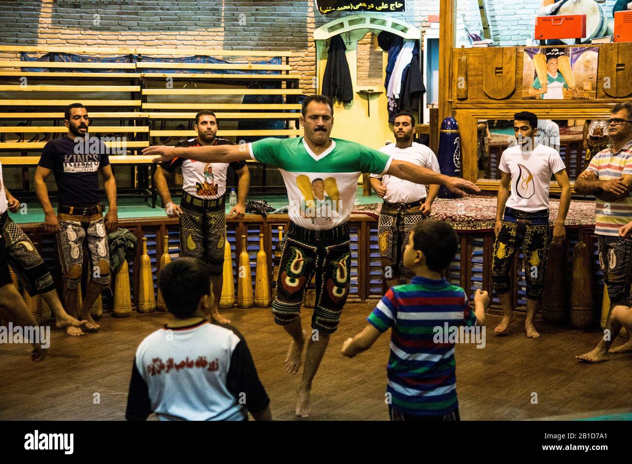 Whirling during Pahlevani and zoorkhaneh ritual in Yazd Stock Photo