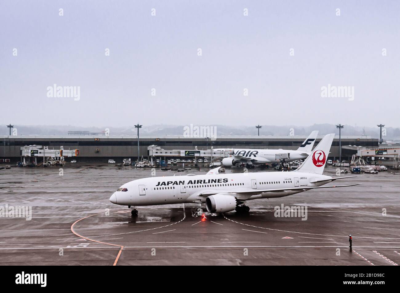 DEC 6, 2018 Narita, Japan Airplane during raining bad weather at
