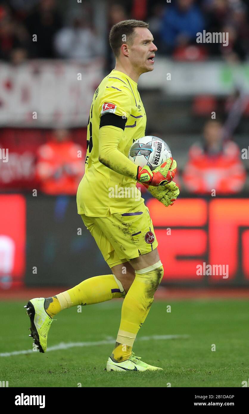 Nuremberg, Germany. 23rd Feb, 2020. Football: 2nd Bundesliga, 1st FC Nürnberg - Darmstadt 98, 23rd matchday at the Max Morlock Stadium. The Nuremberg goalkeeper Christian Mathenia plays the ball. Credit: Daniel Karmann/dpa - IMPORTANT NOTE: In accordance with the regulations of the DFL Deutsche Fußball Liga and the DFB Deutscher Fußball-Bund, it is prohibited to exploit or have exploited in the stadium and/or from the game taken photographs in the form of sequence images and/or video-like photo series./dpa/Alamy Live News Stock Photo