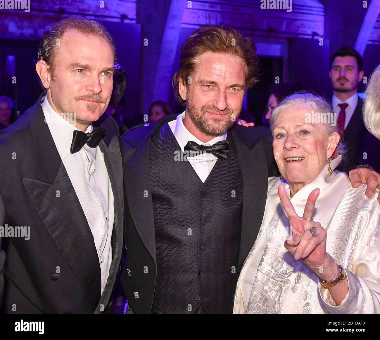 Berlin, Germany. 23rd Feb, 2020. 70th Berlinale, Cinema for Peace Gala: Carlo Gabriel Nero (l-r), the son of Vanessa Redgrave and Franco Nero, actor Gerard Butler and director Vanessa Redgrave The International Film Festival takes place from 20.02. to 01.03.2020. Credit: Jens Kalaene/dpa-Zentralbild/dpa/Alamy Live News Stock Photo