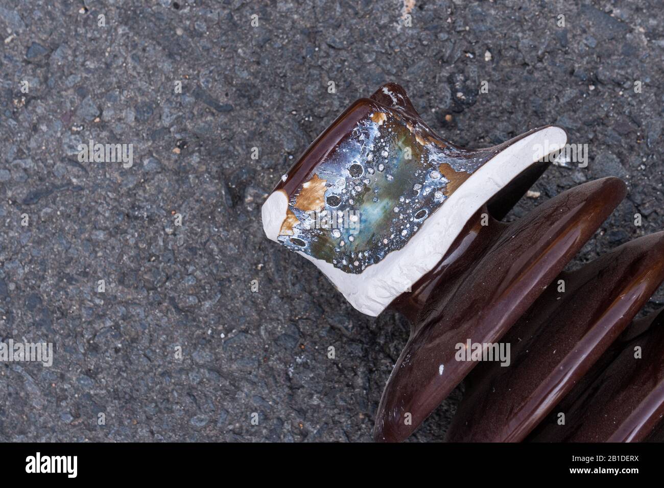 The insulator defective due to short circuit of the high voltage. As a