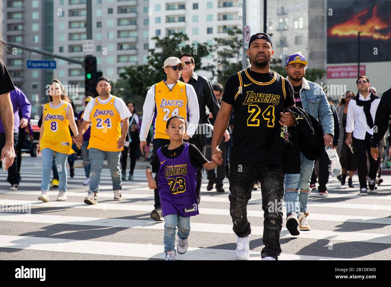 Los Angeles, USA. 24th Feb, 2020. Fans arrive to attend a public memorial for Kobe Bryant and his daughter, Gianna, at the Staples Center in Los Angeles, the United States, Feb. 24, 2020. Credit: Qian Weizhong/Xinhua/Alamy Live News Stock Photo