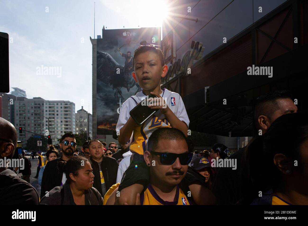 Los Angeles, USA. 24th Feb, 2020. Fans arrive to attend a public memorial for Kobe Bryant and his daughter, Gianna, at the Staples Center in Los Angeles, the United States, Feb. 24, 2020. Credit: Qian Weizhong/Xinhua/Alamy Live News Stock Photo