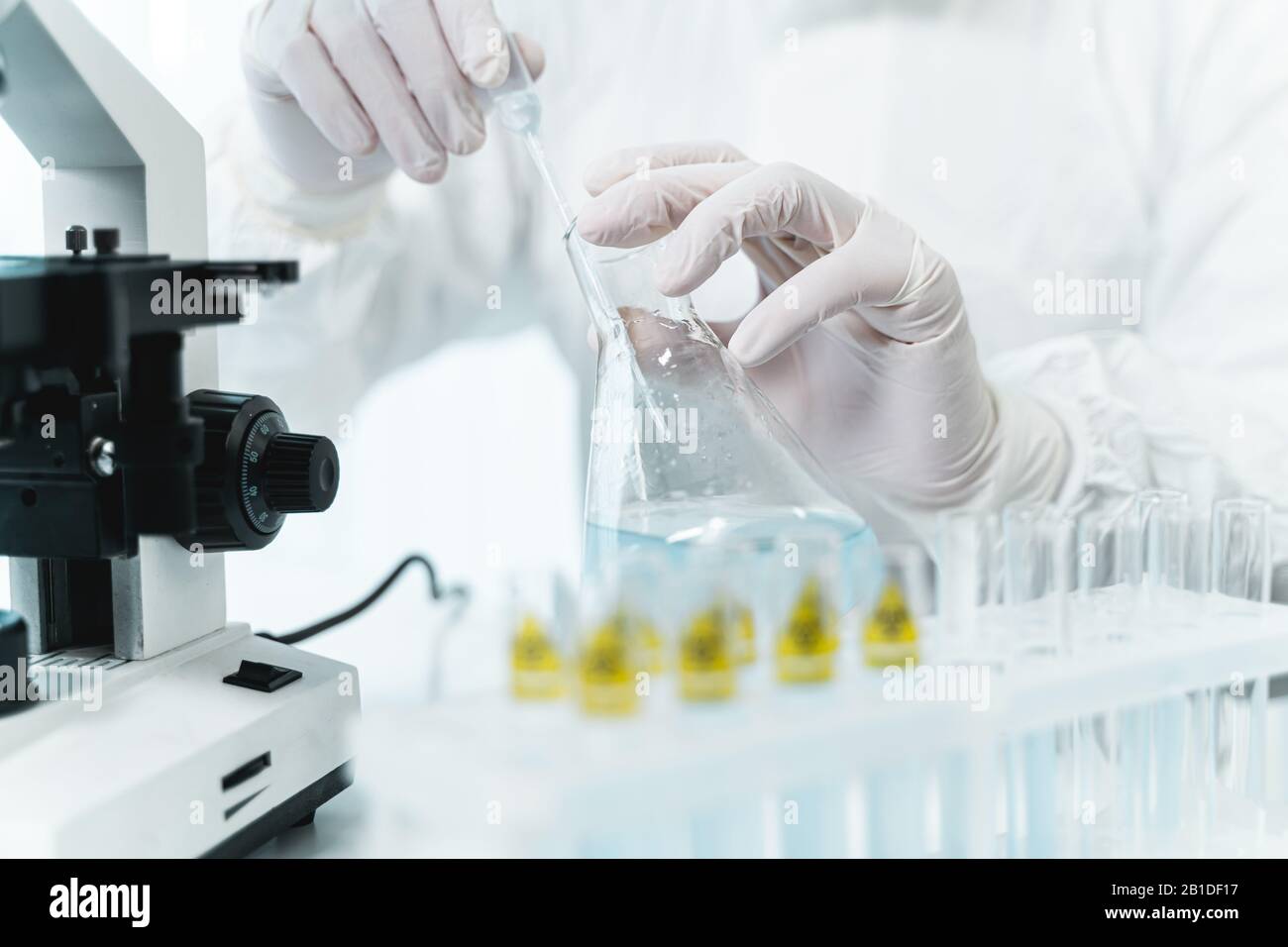Lab worker taking sample hi-res stock photography and images - Alamy