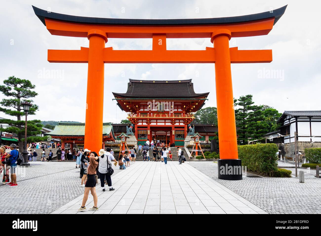 Kyoto, Japan, August 16, 2019 – Giant orange torii gate in front of ...